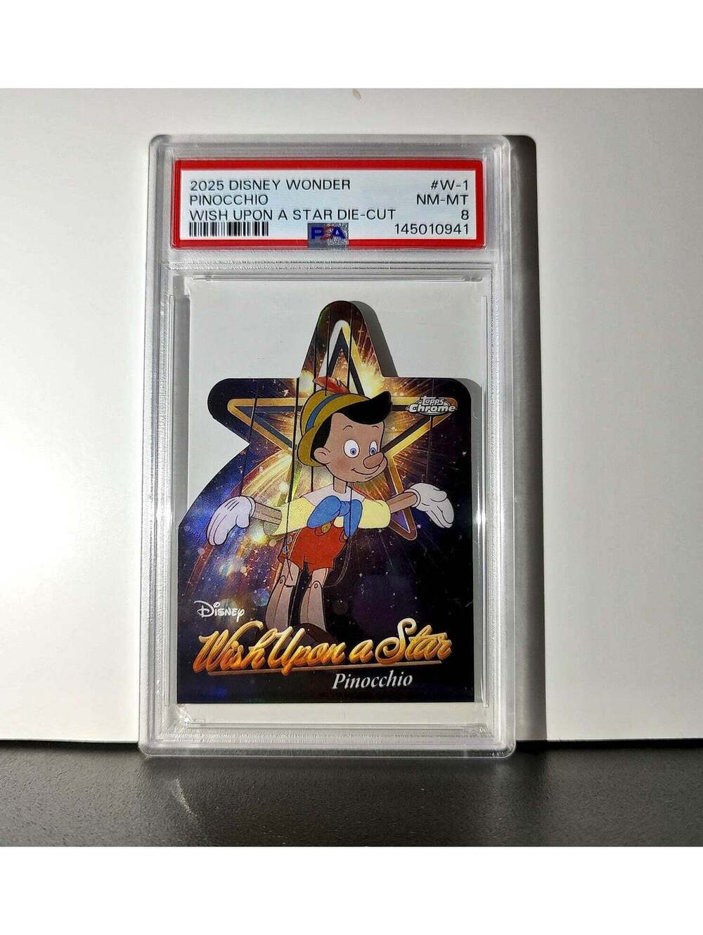 Pinocchio 2025 Topps Chrome Disney #W-1 Wish Upon A Star Die Cut Pinocchio PSA 8